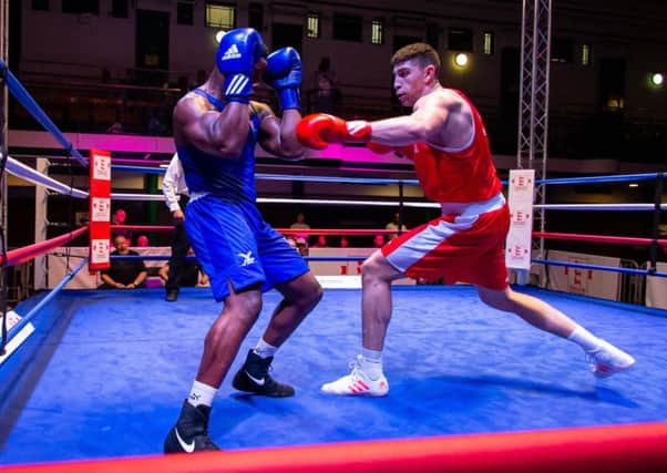 Lewis Williams is on the front foot against Natty Ngwenya in the Senior Elite Championships at York Hall. Picture: Georgie Kerr