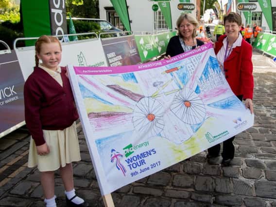 Ava Grimes from St Benedict's School in Atherstone, winner of the Womens Tour Start Flag Design Competition in 2017, opening last year's Warwickshire stage.