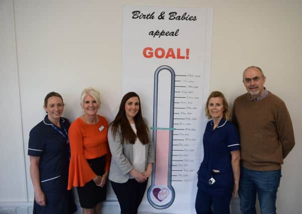 L-R Carrie Daniels, Labour Ward Co-ordinator, Helen Lancaster, Director of Operations, Rachel Jones, Head of Community Engagement at Stratford Town Trust, SWFT midwife and Tony Jackson, Trustee of Startford Town Trust