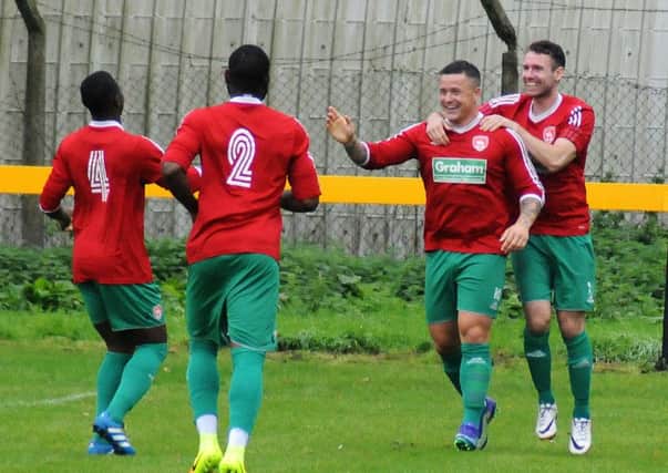 Ben Mackey, seen here after scoring against Racing Club, has committed to Scott Easterlow's side for next season.
