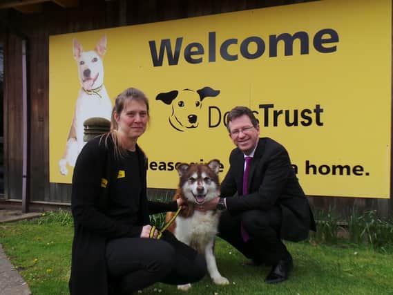 Helen Barlow of Dogs Trust with Jeremy Wright MP, and Coco the Alaskan Malamute
