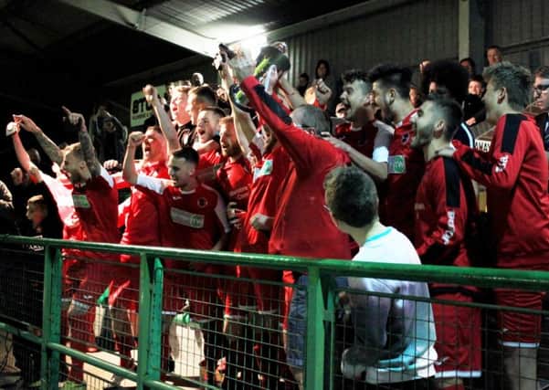 Atherstone lift the cup. Pictures: Brixon Photography