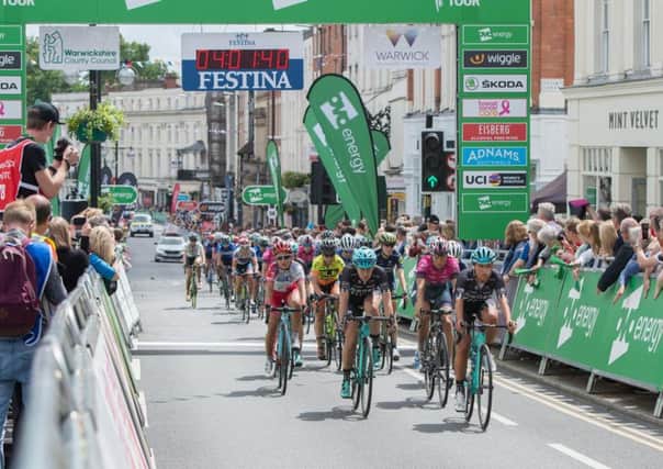 Riders crossing last year's finish line on the Parade in Leamington last year