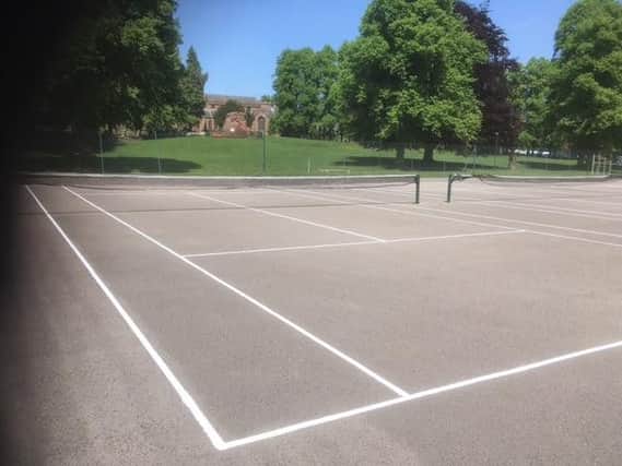 The new lines painted on Abbey Fields' tennis courts