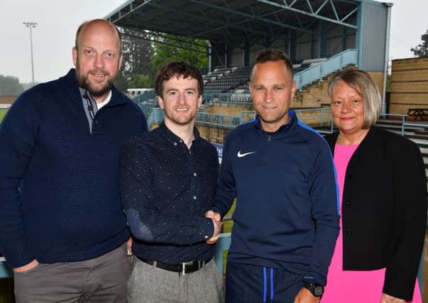 Launching the Academy at Butlin Road - Richard Overson (Academy Patron), Neil Melvin (Rugby Town FC Director),  Liam ONeill (Academy Manager) and Moira MacCormac (National Operations Director, Morthyng Group)