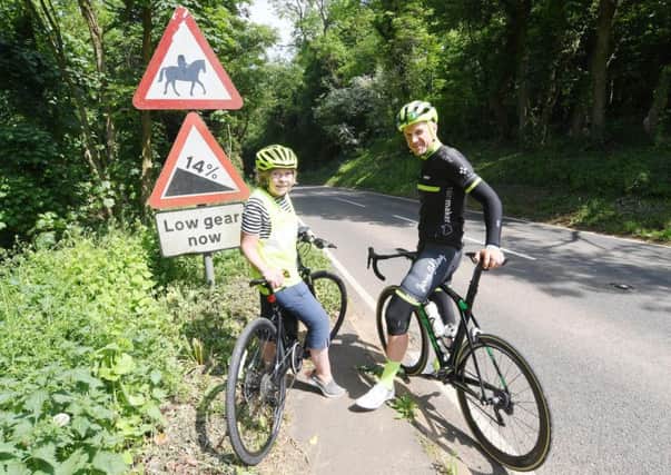 Warwickshire County Council leader Izzi Seccombe at the top of Edge Hill with James Golding. Photo: OVO Energy Women's Tour