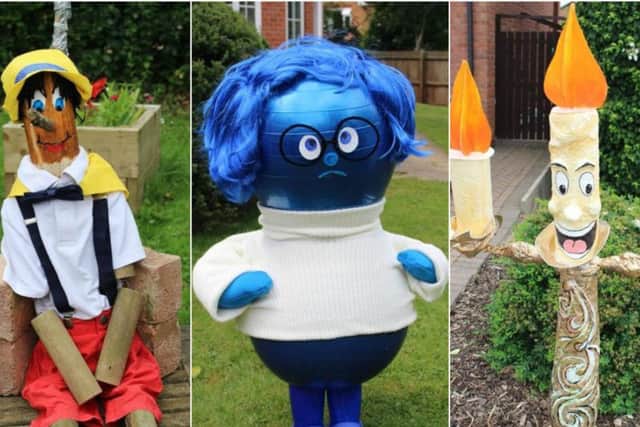 Scarecrows from last year's Disney themed trail