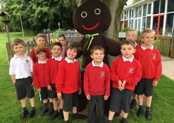 Thorns Infant pupils with the Gingerbread Man scarecrow