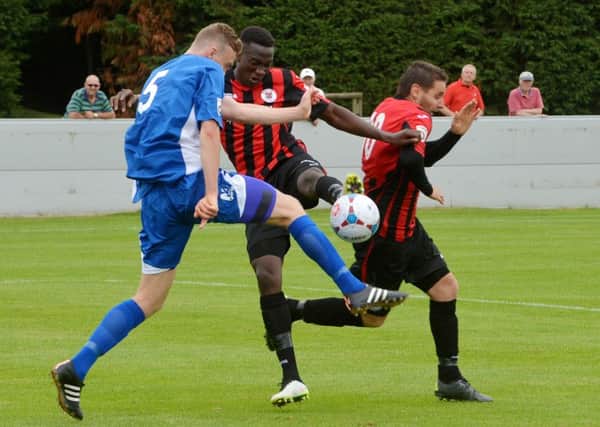 Kieran Morris, left, in action for Worcester City against Brackley Town.