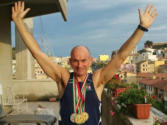 Simon Perkin with his three gold and one silver medals from the European Transplant Games