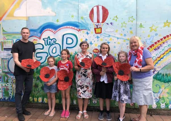 Pictured with some of the  youngsters are Matt Deakin (Warwickshire Young Carers), Elizabeth Hunter (immediate past Chairman of The Arts Society, Leamington) and Helen Fitzpatrick (from Warwick Poppies 2018).