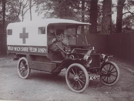 Sergeant Geoffrey Gibbs driving a Warwickshire Yeomary ambulance during the war