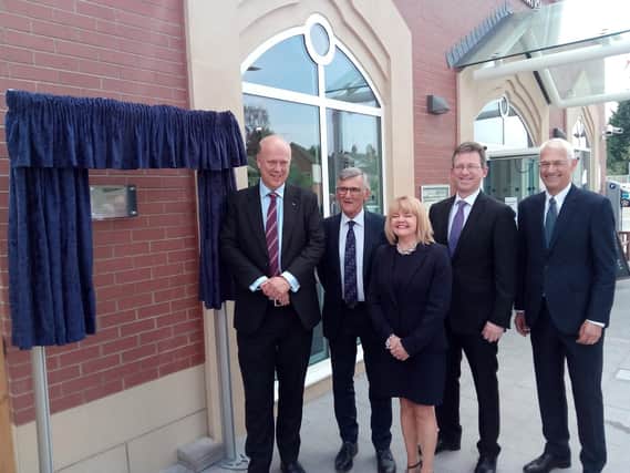The plaque outside the Kenilworth Station entrance. From left: Transport Secretary Chris Grayling MP, deputy leader of Warwickshire County Council Cllr Peter Butlin, joint managing director of WCC Monica Fogarty, Kenilworth and Southam MP Jeremy Wright, and chair of Coventry and Warwickshire Local Enterprise Partnership Jonathan Browning