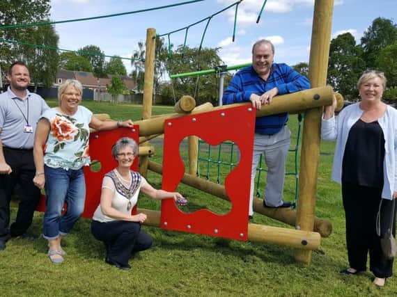 Councillors at the opening of the play equipment at Bates Memorial Park in May - although not all of the equipment was delivered and ready at that time