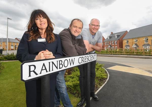 Photograph at the David Wilson Homes Mercia - Oakfields development in Harbury near Leamington. 

Pictured with one of the road name signs are (l-r) Kate Auld (DWH Sales Advisor), Tim Lockley (Chairman of the Harbury Parish Council) and Chris Gibb (Harbury Parish Council) 


(Commissioned by Catherine Senior - Unsworth Sugden)
Photo by Mike Sewell.