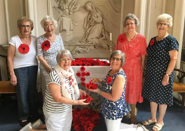 Representatives of Leamington and Warwick Soroptimists with their poppies.