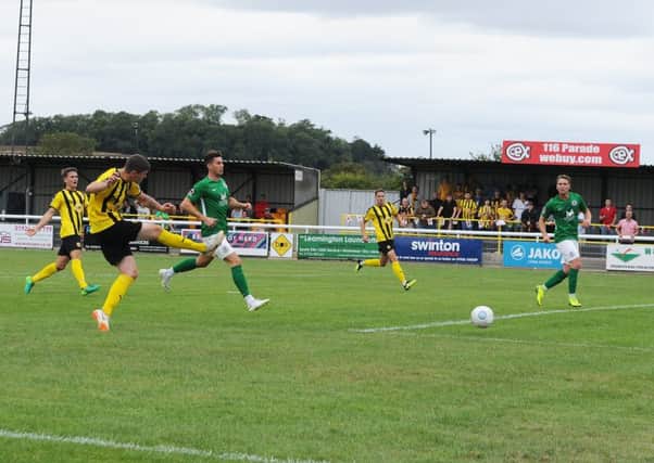 Matty Stenson slots home Brakes' opener just before half-time. Pictures: Morris Troughton