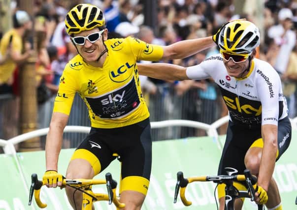 Picture by Alex Broadway/ASO/SWpix.com - 29/07/18 - Cycling - 2018 Tour de France - Stage Twenty-One - Houilles to Paris Champs-Ã‰lysÃ©es - Geraint Thomas celebrates winning the overall classification with team mate Chris Froome.