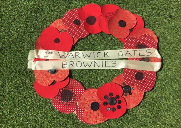 Some of the poppies made by the Warwick Gates Brownies group.