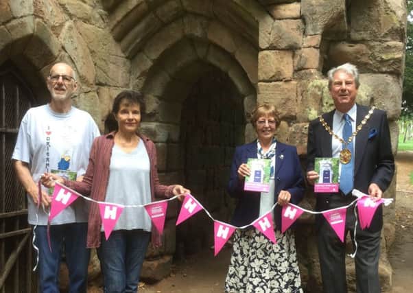 Stephen Cross, chairman of WDC with Michael Formstone, Margaret Kane and Jan Cooper from the Kenilworth History and Archaeological Society who will be leading a free guided walk of Kenilworth Abbey ruins.