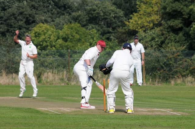 Leek Wootton's Dave Allison is bowled by David McInnes. Pictures: Morris Troughton