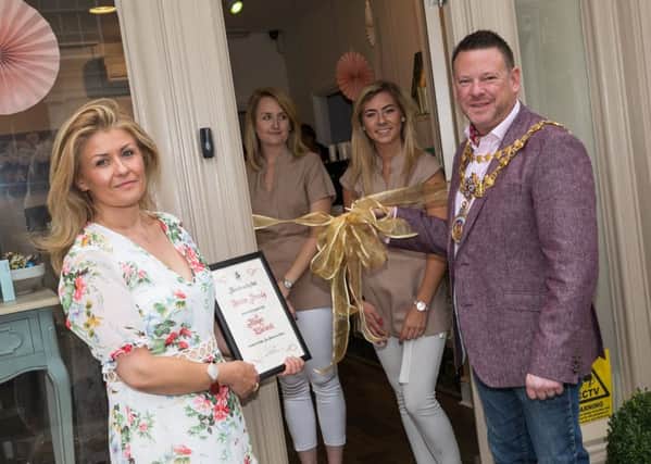 The Mayor of Warwick, Richard Eddy officially opening Serein Beauty in Warwick.