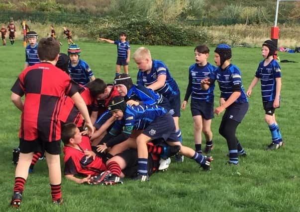 Under 12s action between Rugby St Andrews and Newbold at Pinley Festival