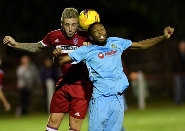 Simeon Tulloch in Tuesday's game against Oadby PICTURES BY MARTIN PULLEY