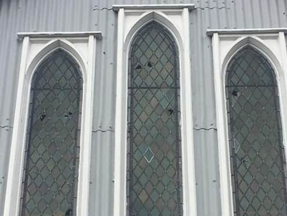 The damaged windows at St Barnabas Church