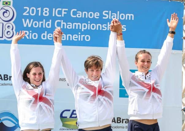 Kimberley Woods (left) on the podium with Fiona Pennie and Mallory Franklin, Great Britain's K1 Women's team who won bronze.  Picture: canoephotography.com/bence vekassy (ICF)