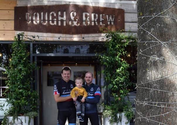 Richard Poynter, Lincoln and Simon Hookey outside Dough and Brew in Warwick.