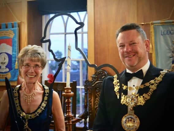 The Bailiff of Warwick Court Leet, Mo Sutherland and the Lord of
the Leet, Warwick Mayor Cllr Richard Eddy, unveiling the Tommy at the Annual Bailiffs Dinner held earlier this month. Photo by Gill Fletcher.