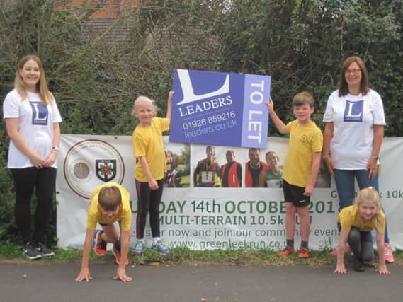 Pupils and race sponsors Leader's Estate Agents preparing for the Green Leek Run