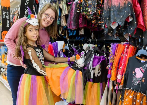Saranne Black wins nationwide competition to have her costume, 'the Unicorn Witch' created and placed in Tesco stores for Halloween.