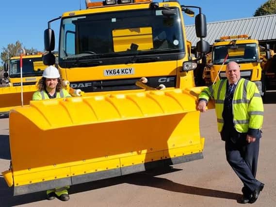 Cllr Jeff Clarke with some of the new gritters