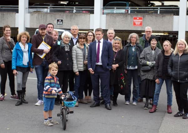 Cllr Colin Quinney of Leam Ward and representatives from the local business community with concerned residents outside the Covent Garden car park where the district council hopes to build its new headquarters.