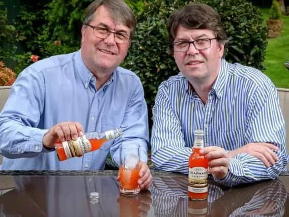 Mike Robinson (left) and Garry Robinson (right) with their Ikoyi Chapmans drink.