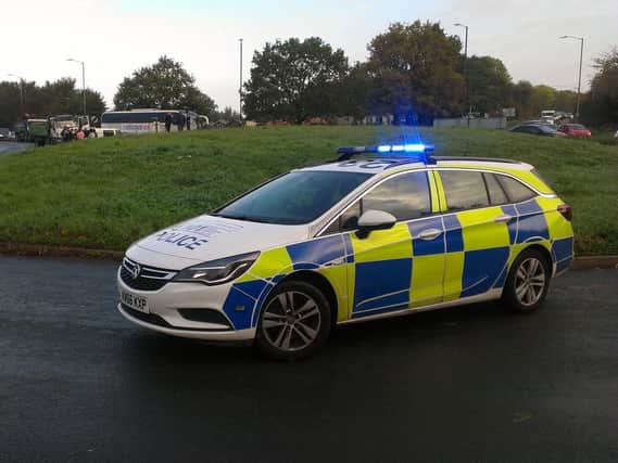 A police car at the scene yesterday