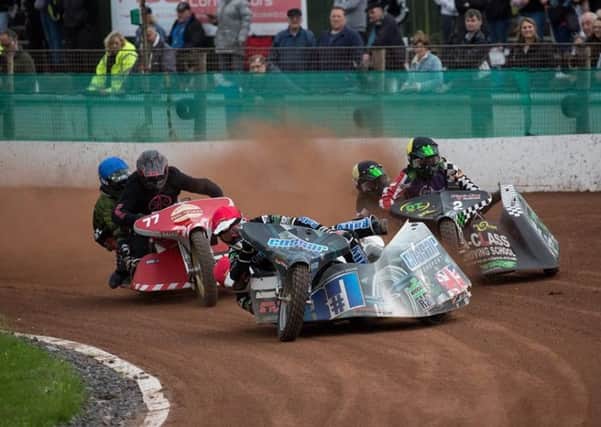 Mark Cossar (pictured in front) will be racing at Leicester on Saturday, in a bid to retain his British Sidecar Speedway title