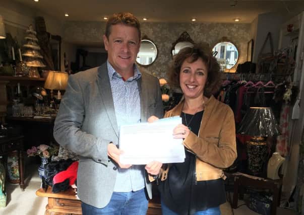 Concerned Leamington resident and local businessman, Russell Allen (of Aubrey Allen) deliver petitions to 'Willow', Warwick Street, one of Leamington's most successful giftware shops, run by Karen Robison.