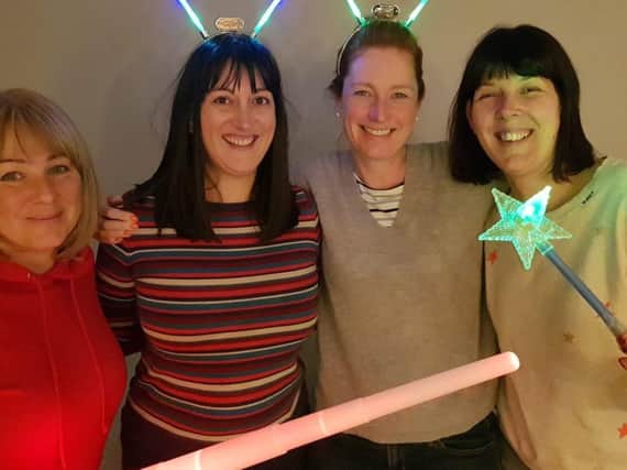 Members of Kenilworth Ladies Circle will be selling light sticks before the Kenilworth Castle fireworks on Saturday November 3 to raise money for Safeline