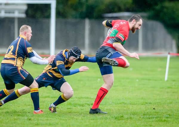 Rugby Welsh's Jamie Roche getting away in last month's derby game with AEI