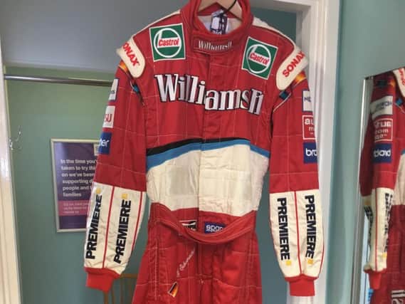 Ralf Schumacher's racing suit could fetch 3,000 at auction for Scope in Kenilworth