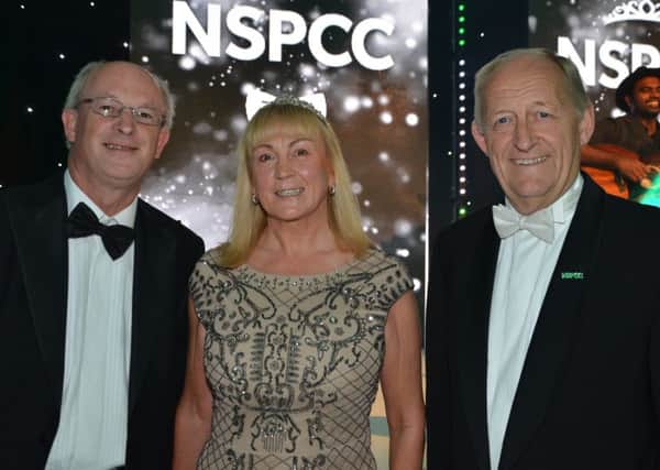 From left, Ian Harnett with April Wickens, community relations officer for JLR, and Les Ratcliffe, chairman for the NSPCC Coventry and Warwickshire Business Group.