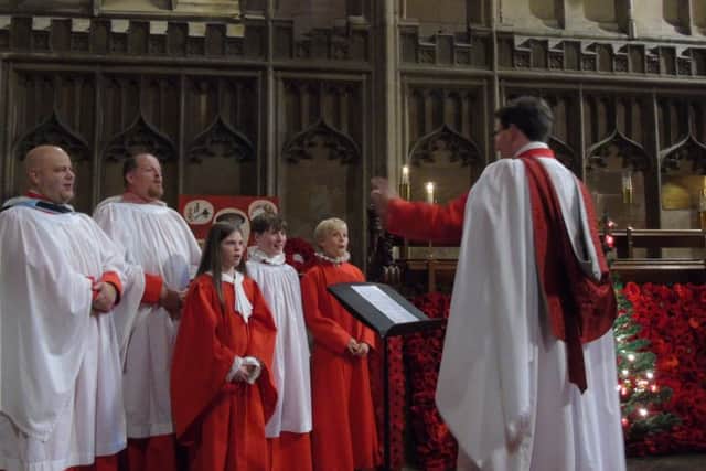 Some members of the St Mary' s Choir with the director of music Oliver Hancock.