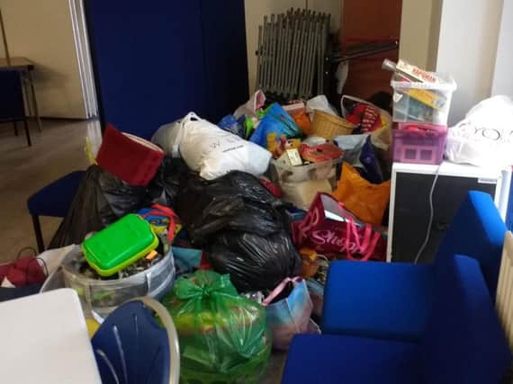 The stack of donations for the Rugby family. Photo: Benn Partnership Centre.