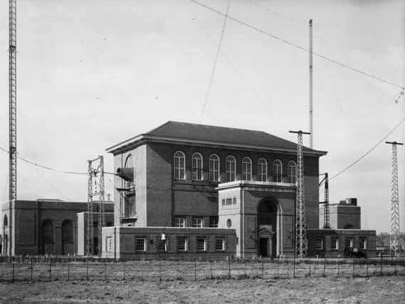 A historic image of the C Station building on the former radio mast site, now the Houlton urban extension.