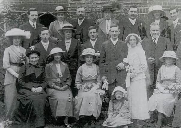 Ada Faulkner is sitting second from the left on the front row