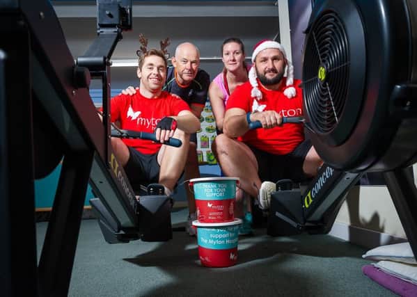 Tom Mountain and John Powell rowing in last Saturdays 100km challenge, with Robert Crofts and  Charlotte Smith supporting
