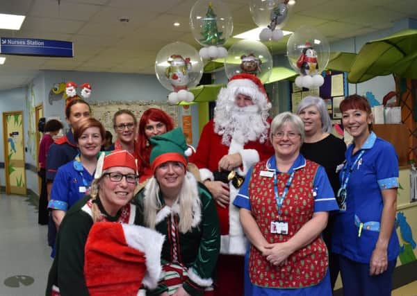 Father Christmas stopped by Warwick Hospital to spread some Christmas cheer. Photo supplied.